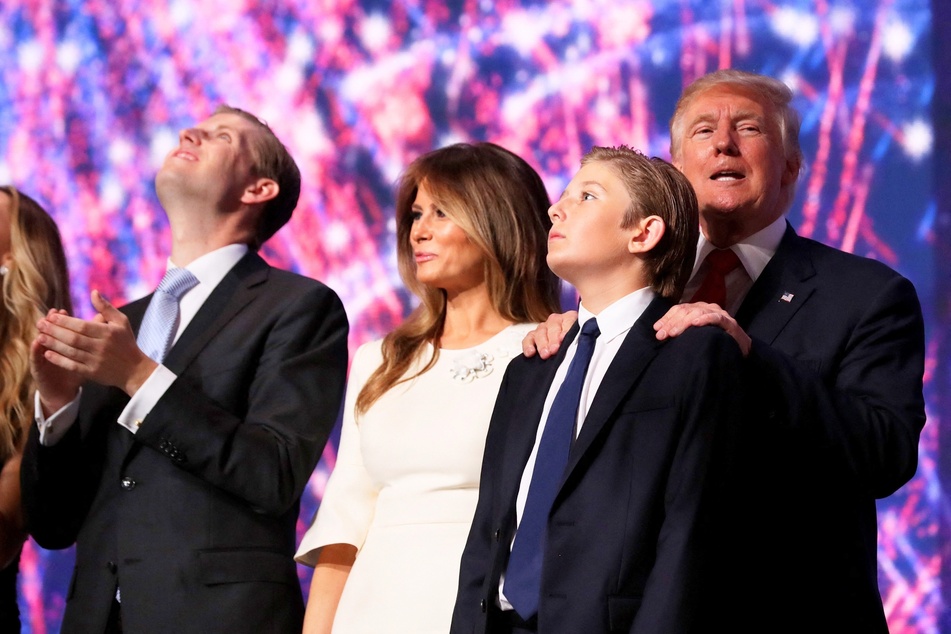 Donald Trump (r.) with (from l. to r.) his son Eric, his wife Melania, and his youngest son Barron during the Republican National Convention in Cleveland, Ohio on July 21, 2016.