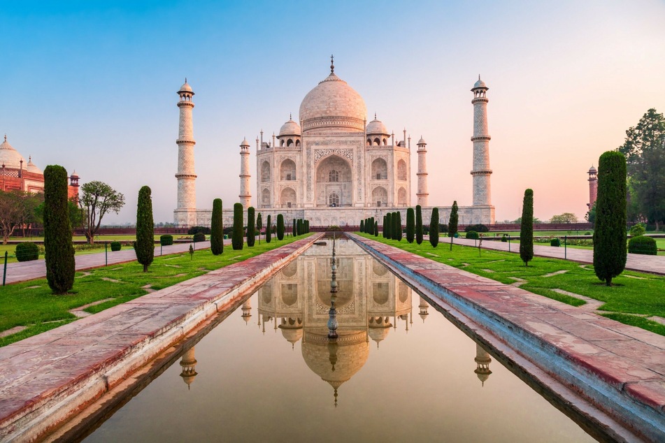 The most beautiful pictures of India's world-famous Taj Mahal are taken especially early in the morning, travel experts say, which is why it opens as early as 6:00 AM (stock image).