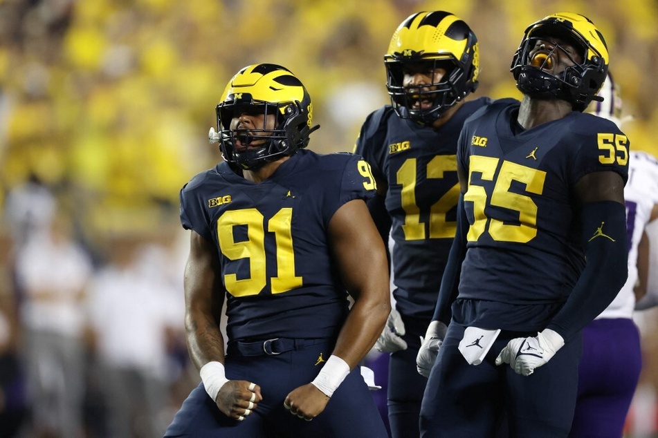 After five years with Michigan, edge Taylor Upshaw (l) has decided to enter the transfer portal and play for a different team, with just one year of college football remaining.