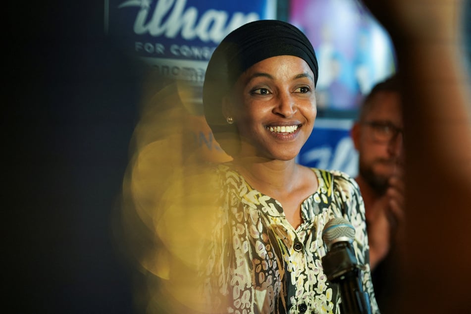 Ilhan Omar speaks to supporters in Minneapolis after announcing her victory in the Democratic primary to represent Minnesota's fifth congressional district.