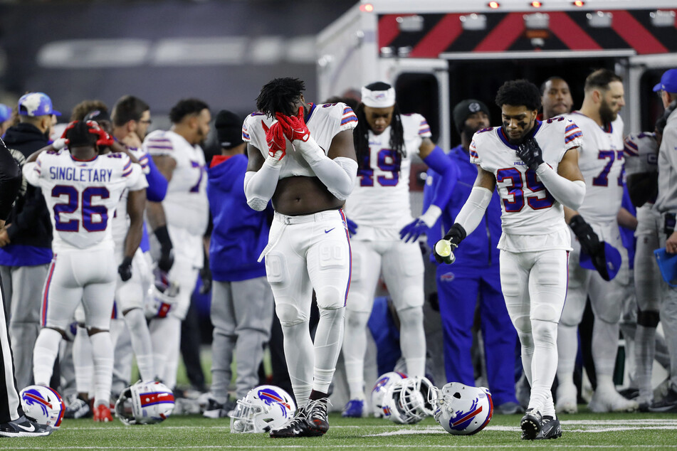 Buffalo Bills players were left distraught as their teammate Damar Hamlin was taken away in an ambulance.