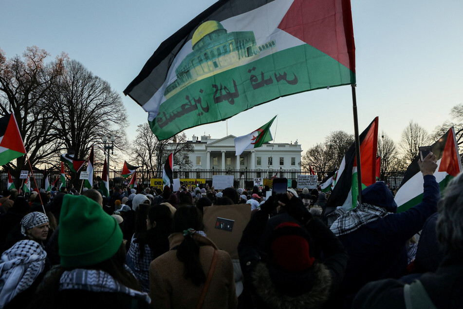Demonstrators chant during the March on Washington for Gaza, in support of the Palestinian people, at Lafayette Park near the White House on January 13, 2024.