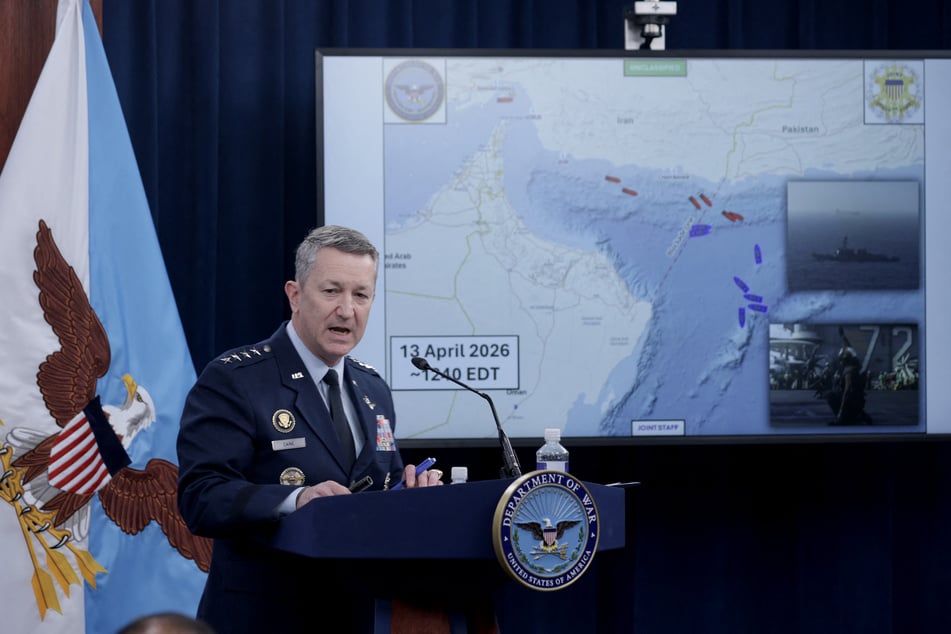 Chairman of the Joint Chiefs of Staff Gen. Dan Caine speaks as he displays a map showing the United States Navy's blockade of the Strait of Hormuz during a press briefing at the Pentagon on April 16, 2026, in Arlington, Virginia.