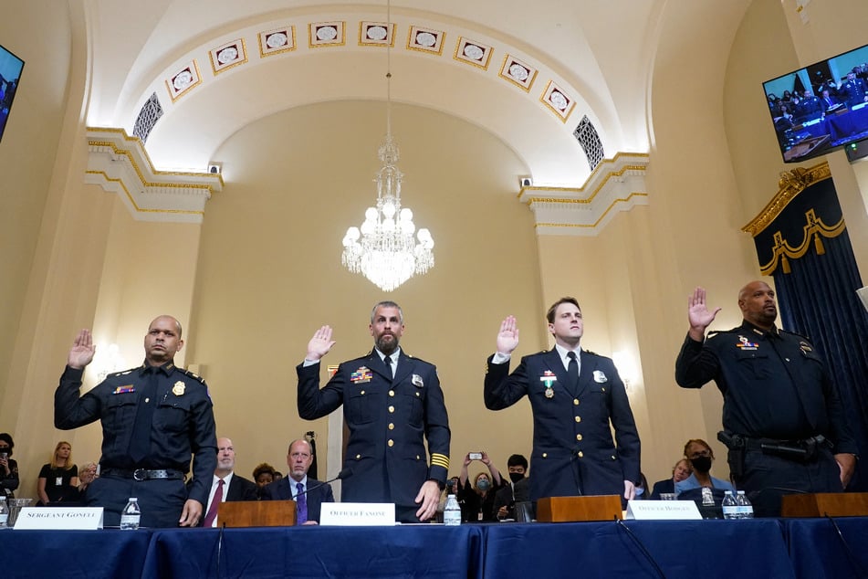 (From l. to r.) Officers Aquilino Gonell, Michael Fanone, Daniel Hodges, and Harry Dunn are sworn in to testify before the House Select Committee investigating the January 6 attack.