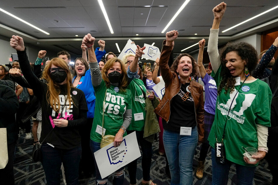 Supporters cheer following the announcement of the projected passage of Issue 1, a state constitutional right to abortion, in Columbus, Ohio.