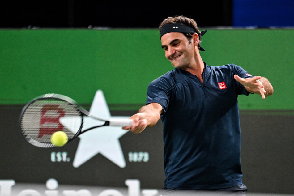 Roger Federer participates in a celebrity doubles match at the Shanghai Masters tennis tournament on October 10, 2025.