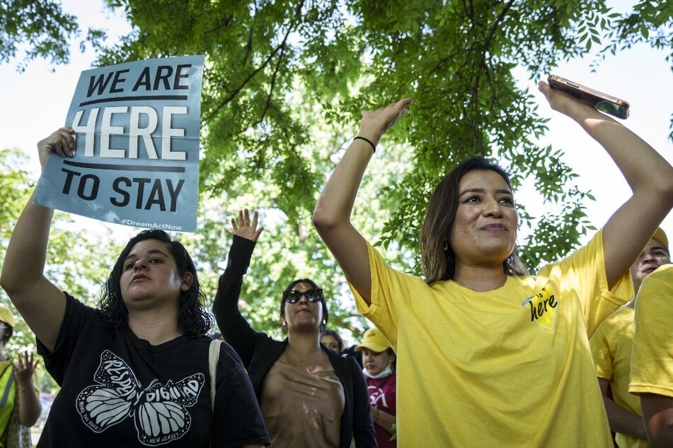 Immigrants' rights activists rally near the US Capitol to urge Congress to pass permanent protections for DACA recipients and create a pathway to citizenship.