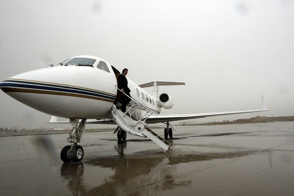 A passenger had to land a private plane at Palm Beach International Airport after the pilot fell ill.