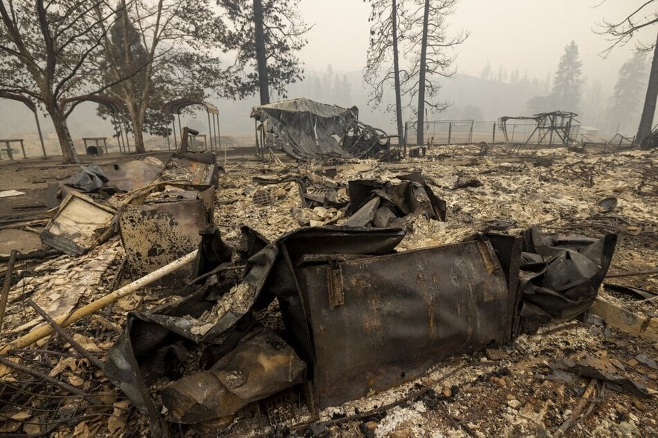 The century-old Klamath River Community Hall lies in ruins after it was destroyed by the McKinney Fire in the Klamath National Forest northwest of Yreka, California, on August 1, 2022.