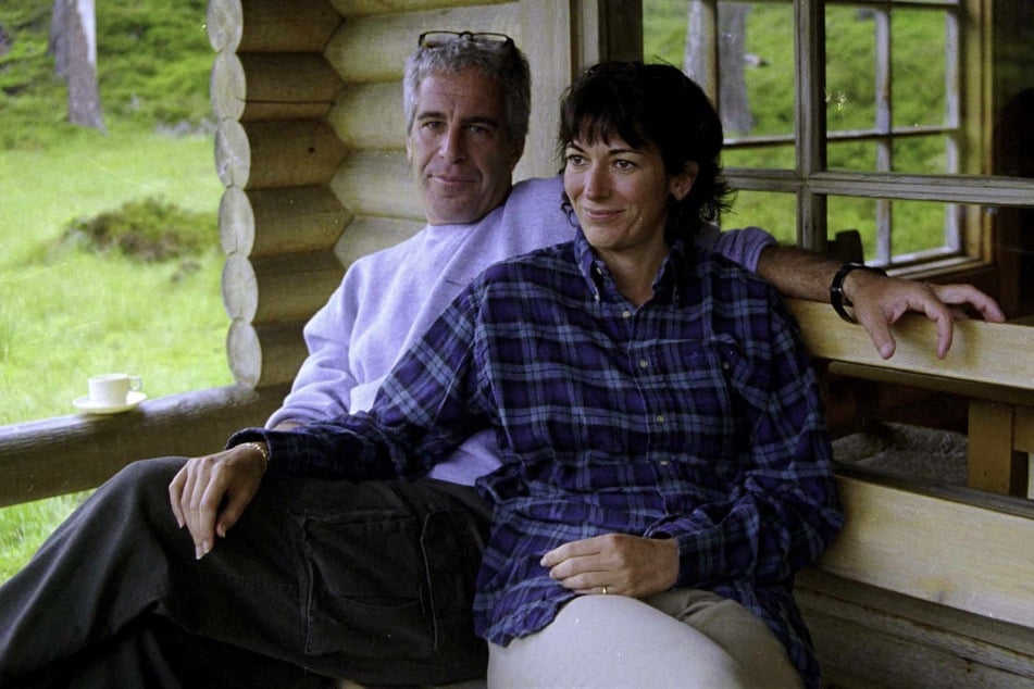 This undated trial evidence image obtained December 8, 2021, from the US District Court for the Southern District of New York shows British socialite Ghislaine Maxwell (r.) and US financier Jeffrey Epstein (l.) in Queen’s log cabin at Balmoral.