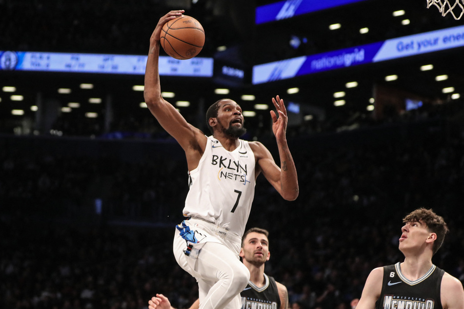 Brooklyn Nets forward Kevin Durant goes up for a dunk in the fourth quarter against the Memphis Grizzlies at Barclays Center.