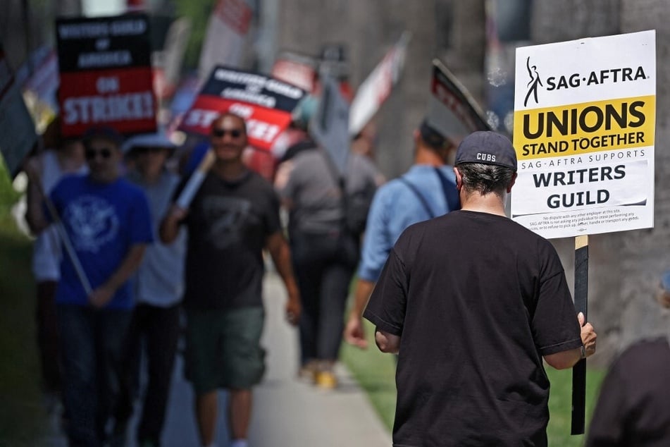 The SAG-AFTRA actors' union is poised to join Writers Guild of America workers on the picket lines if a deal is not reached by Wednesday at midnight.
