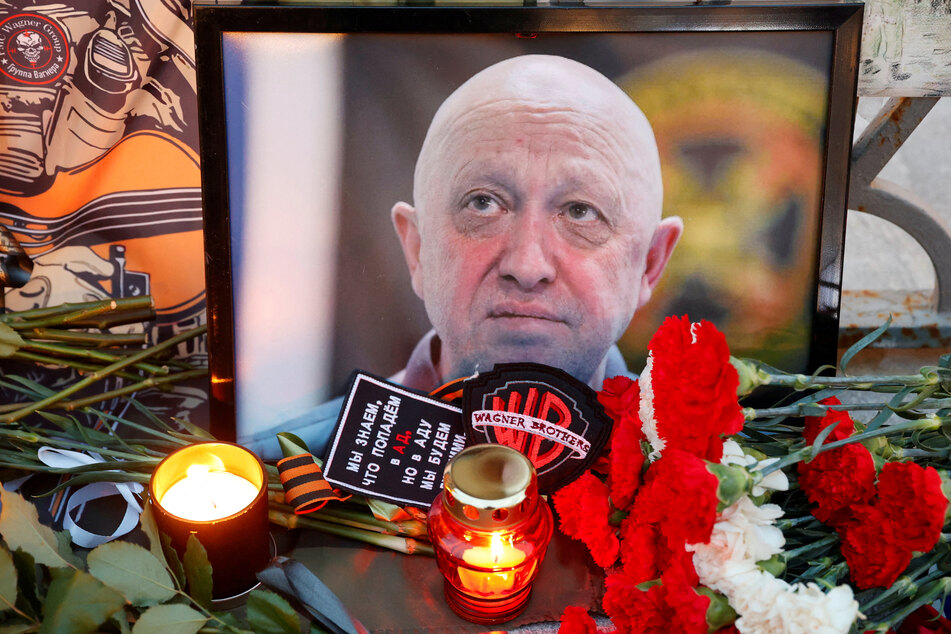 A photo of Wagner mercenary chief Yevgeny Prigozhin is on display at a makeshift memorial in Moscow, Russia.
