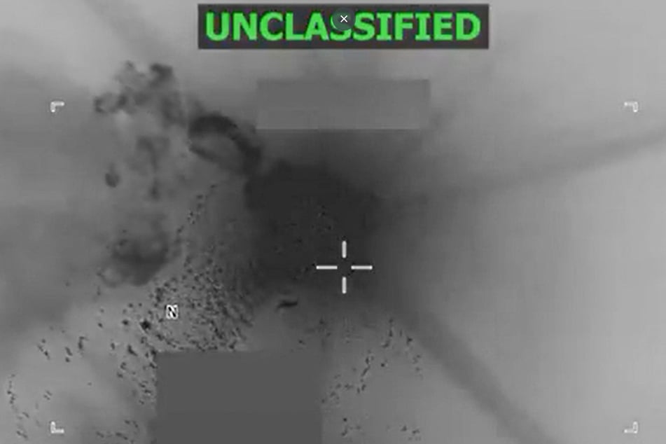 A screen grab from a video posted by Defense Secretary Pete Hegseth on his X account shows what Hegseth says US military forces conducting a strike on a vessel in the Caribbean Sea on October 23, 2025.