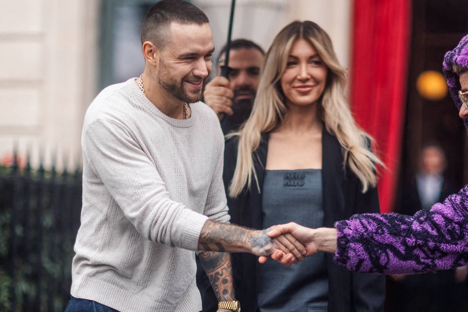 Nearly a year after his tragic death, Liam Payne's (l.) girlfriend Kate Cassidy has gotten another tattoo tribute to her late boyfriend.