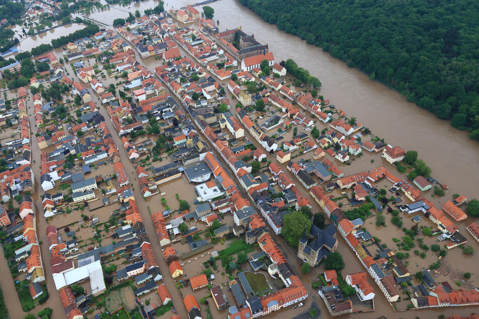 Auch die Warnung vor akuter Hochwassergefahr - im Foto die 2013 überschwemmte Innenstadt von Grimma - soll geprobt werden.