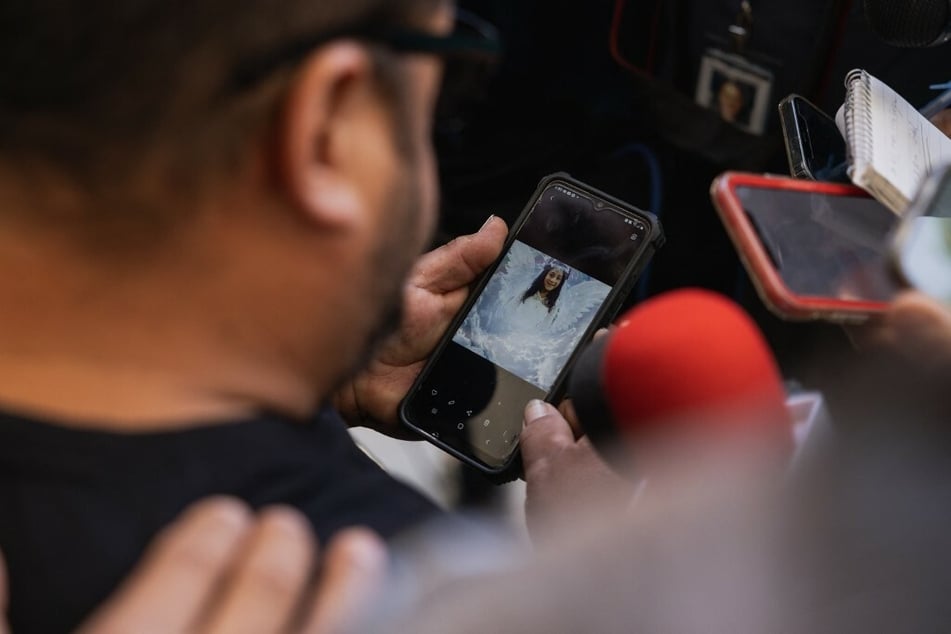 Jacinto Cazares showed a photo of his daughter who was killed at Robb Elementary School, 10-year-old Jackie Cazares.