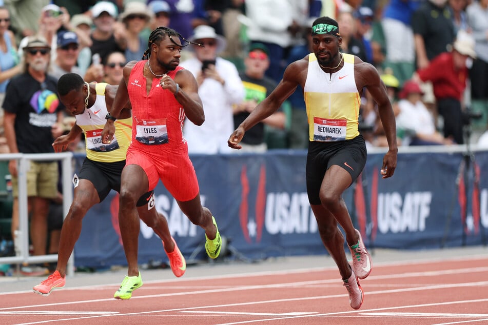 Noah Lyles stares down Kenny Bednarek in the Xfinity Men's 200m final during the 2025 USATF Outdoor Championships.