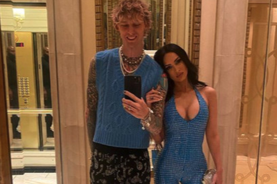 MGK revealed the matching voodoo doll tattoos he and Fox got in honor of her 36th birthday, along with a new photo of the duo in matching blue attire.