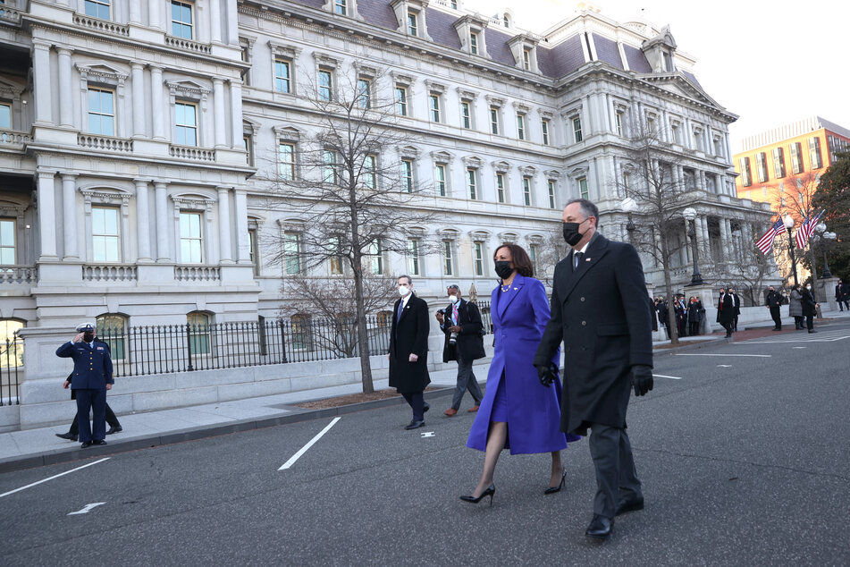 Vice President Kamala Harris and her husband Doug Emhoff arrive at the Eisenhower Executive Office Building in Washington DC.