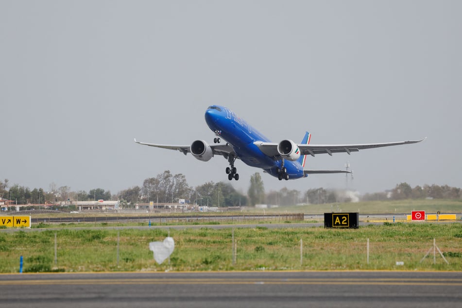 The papal plane carrying Pope Leo XIV takes off at Fiumicino Airport on April 13, 2026.