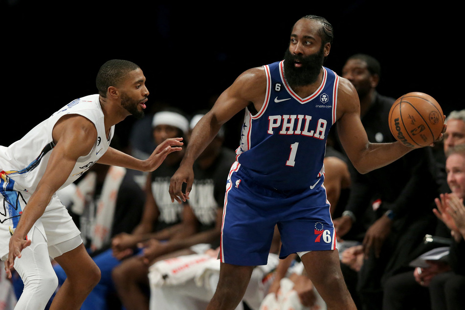 Philadelphia 76ers guard James Harden controls the ball against Brooklyn Nets forward Mikal Bridges during the third quarter at Barclays Center.