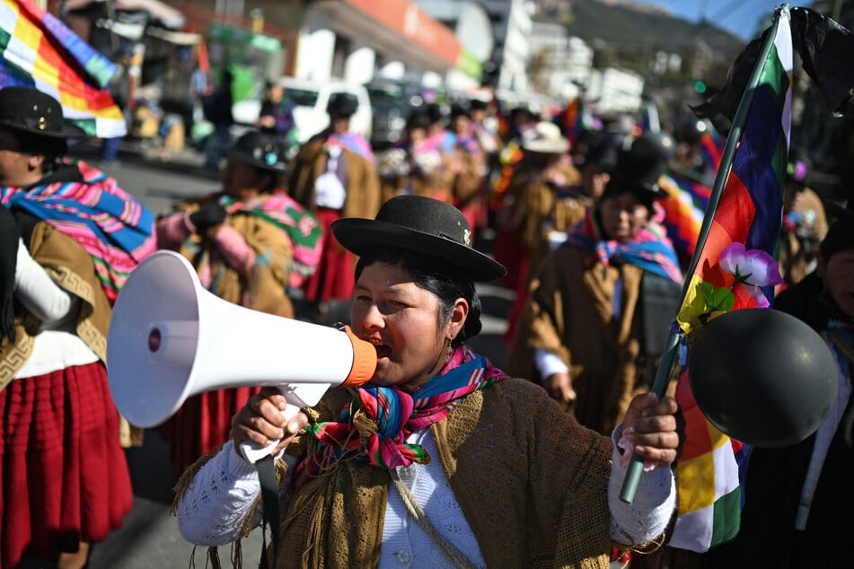 An Indigenous woman uses a megaphone during a protest against the government of President Rodrigo Paz in La Paz, Bolivia, on May 27, 2026.
