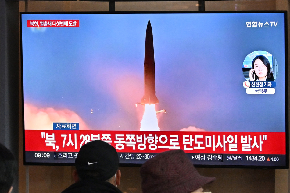 A news broadcast showed the North Korean missile test on TV, as North Korea fired a mid-range ballistic missile on Tuesday which flew over Japan in a record-breaking weapons-testing blitz.