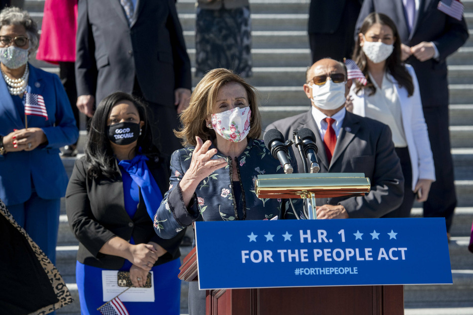 Speaker of the House Nancy Pelosi is joined by House Democrats for a press conference regarding the For the People Act of 2021.