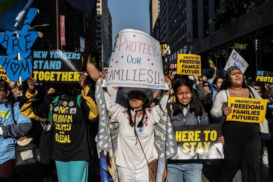 Immigrants and allies march against mass deportation threats in New York City after Donald Trump's 2024 presidential election win.