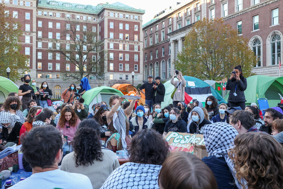 Jewish students host Passover Seder at Columbia University's Gaza Solidarity Encampment, calling for the liberation of the Palestinian people.