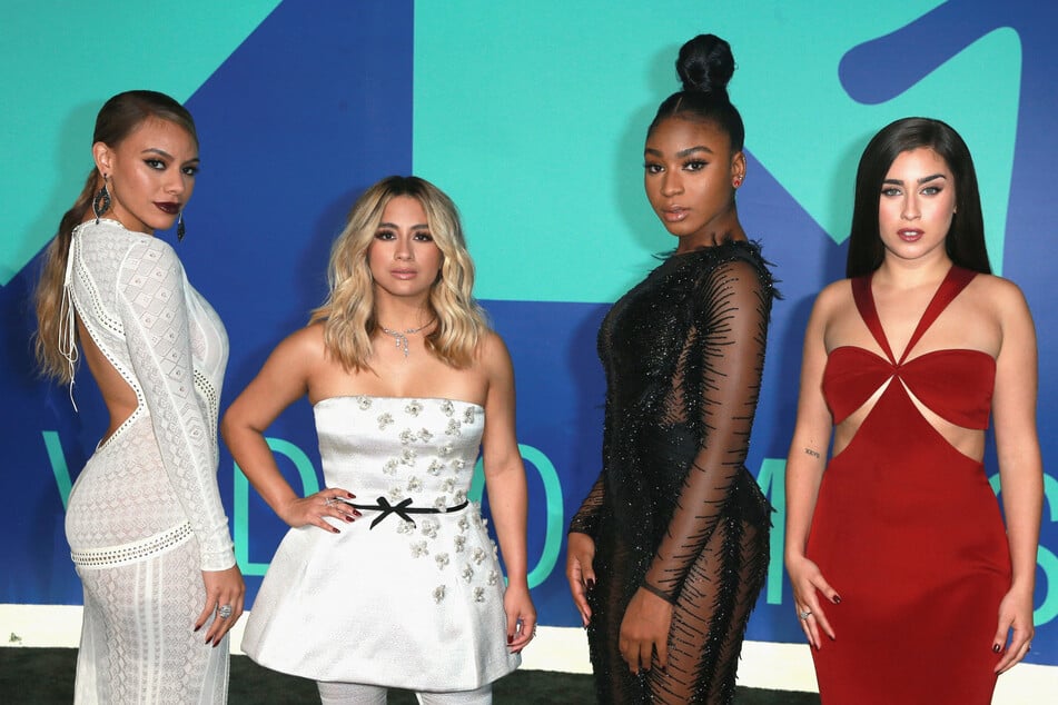 (From l. to r.) Fifth Harmony stars Dinah Jane, Ally Brooke, Normani, and Lauren Jauregui surprised fans at a Jonas Brothers show in Dallas, Texas over the weekend.