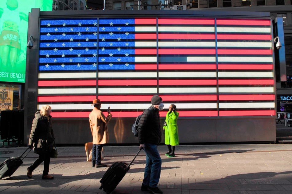 A Bronx man who was beaten up in Times Square on live television after being misidentified as a migrant is now suing the vigilante group behind the attack.