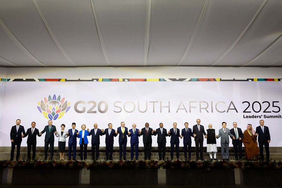 US President Donald Trump is noticeably missing from a family picture taken during the G20 Leaders' Summit in Johannesburg, South Africa, on November 22, 2025.