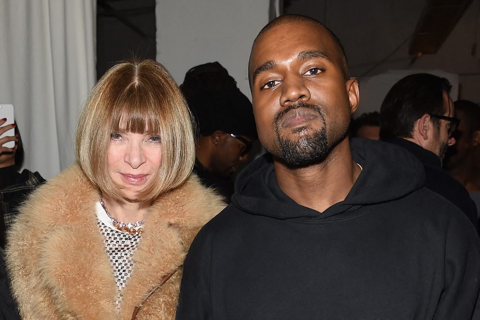Another one! Kanye "Ye" West (r) has reportedly lost another partnership as Vogue has announced it has "no intention" of working with him again.