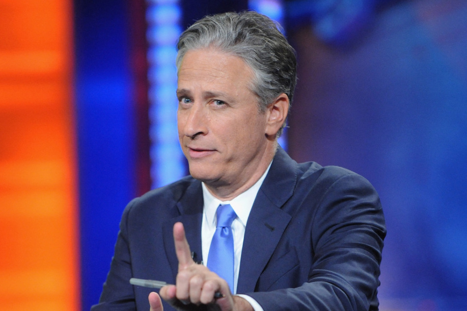 Jon Stewart will return to The Daily Show as a part-time host and an executive producer in February.