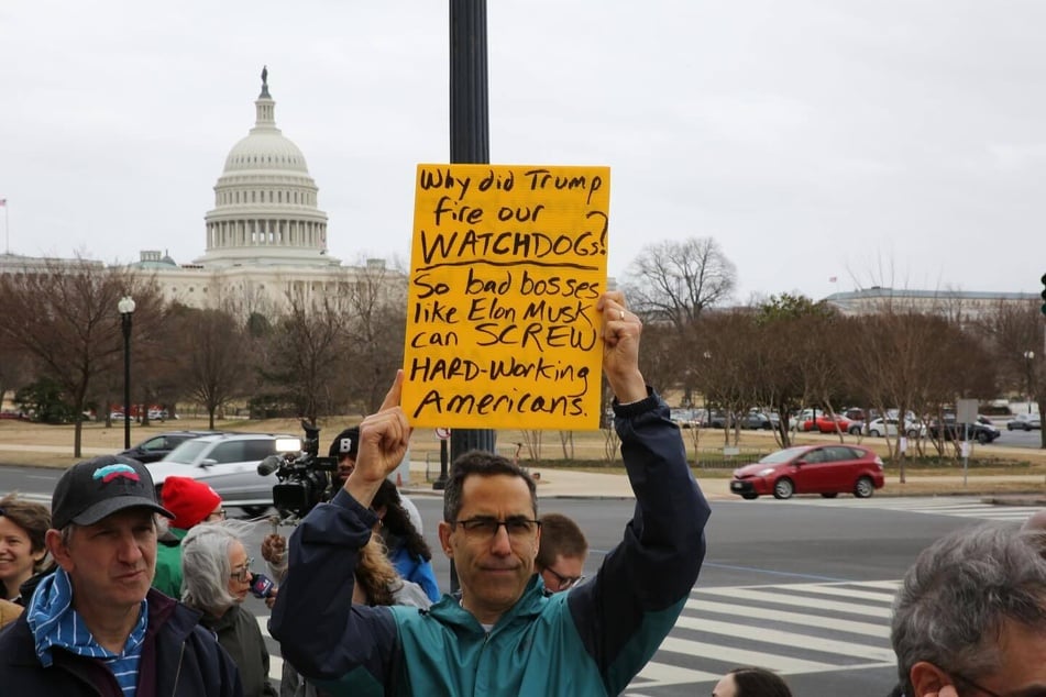 Working people rally in support of National Labor Relations Board member Gwynne Wilcox during a federal court hearing on a lawsuit challenging her termination by Donald Trump.