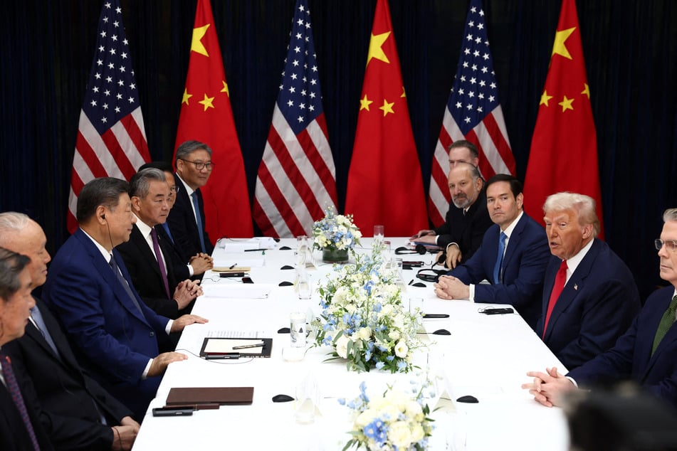 Trump and Xi were joined by some of their top respective officials at the meeting in Busan, South Korea.