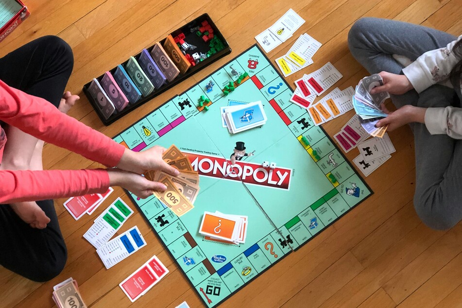 A recovered backpack allegedly belonging to the suspected shooter was reported to contain just two items – a Tommy Hilfiger jacket and colorful fake paper money from the board game Monopoly.