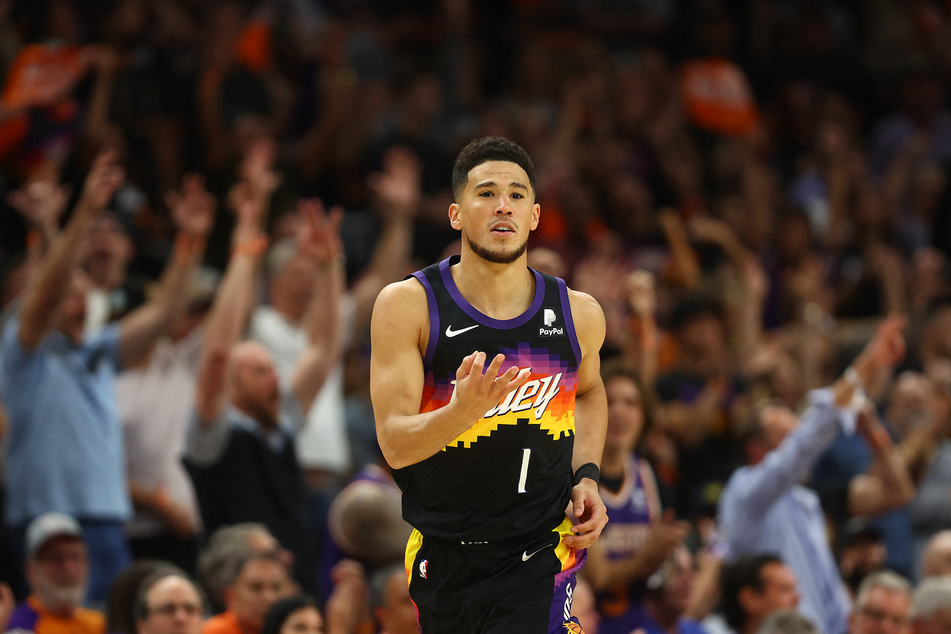 The Suns' Devin Booker partnered up with Chris Paul to shoot down the Mavs.