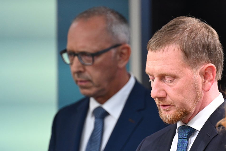 Die CDU um Sachsens Ministerpräsident Michael Kretschmer (49, r.) siegte knapp vor der AfD um Jörg Urban (60).