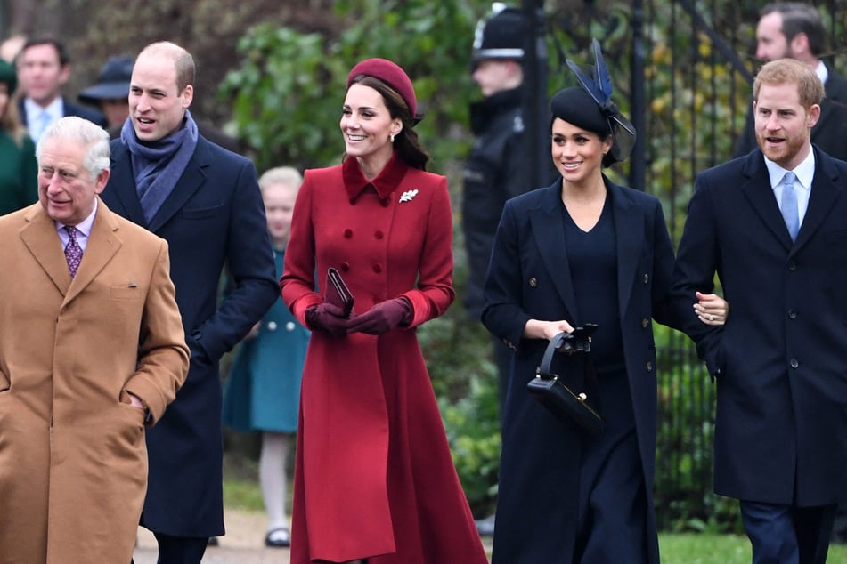 Prince Harry (far r.) is sharing new details about the tension within the royal family.