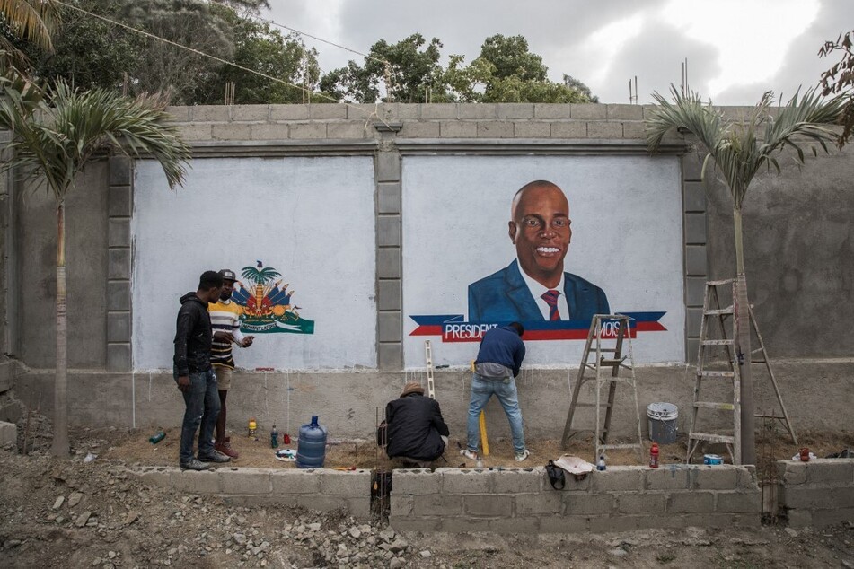 Local artists paint murals in tribute to slain President Jovenel Moïse in Cap-Haitien, Haiti.