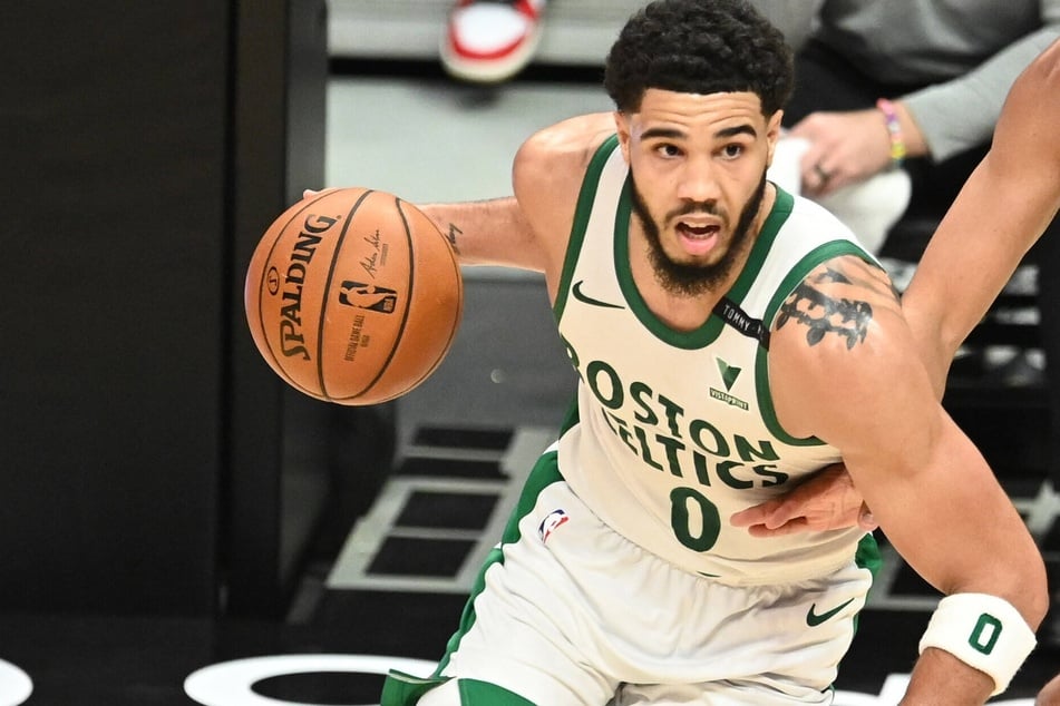 Jayson Tatum scored his first career triple-double as the Celtics lost to the Bulls 102-96