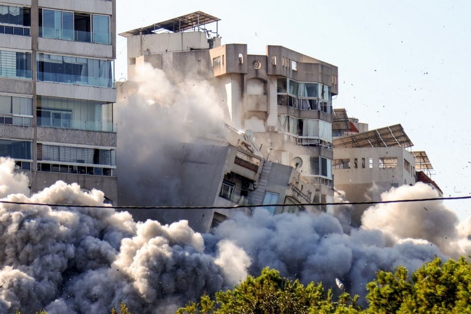 A building collapses after an Israeli airstrike on Beirut's southern Ghobeiry neighborhood on November 15, 2024.