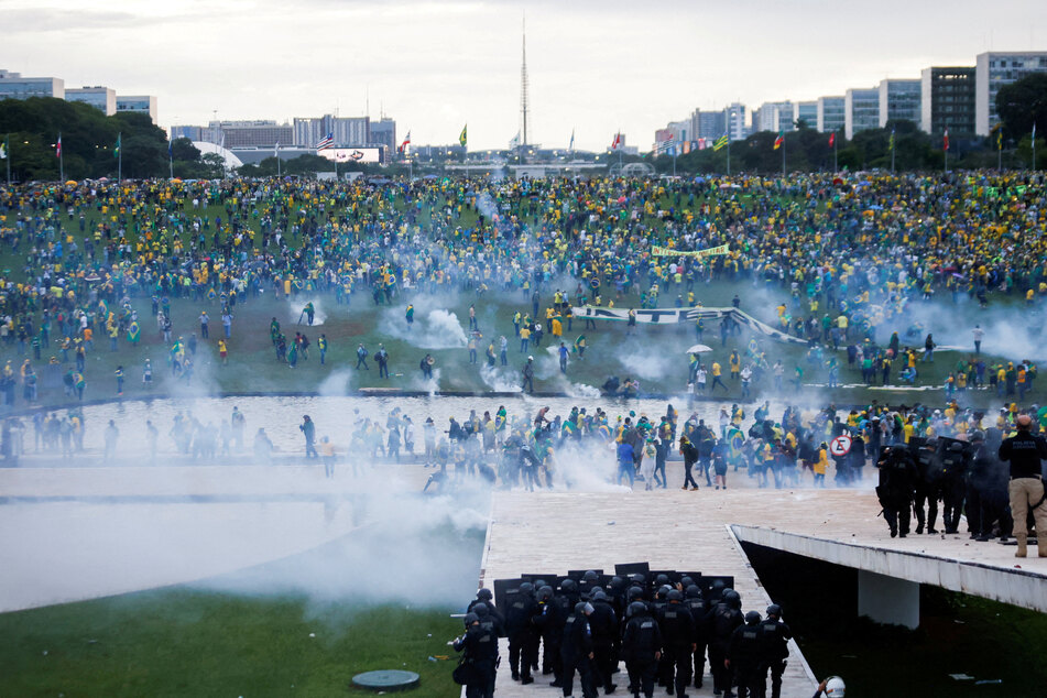 Police fought off rioting Bolsonaro supporters outside Brazil's National Congress bulding.