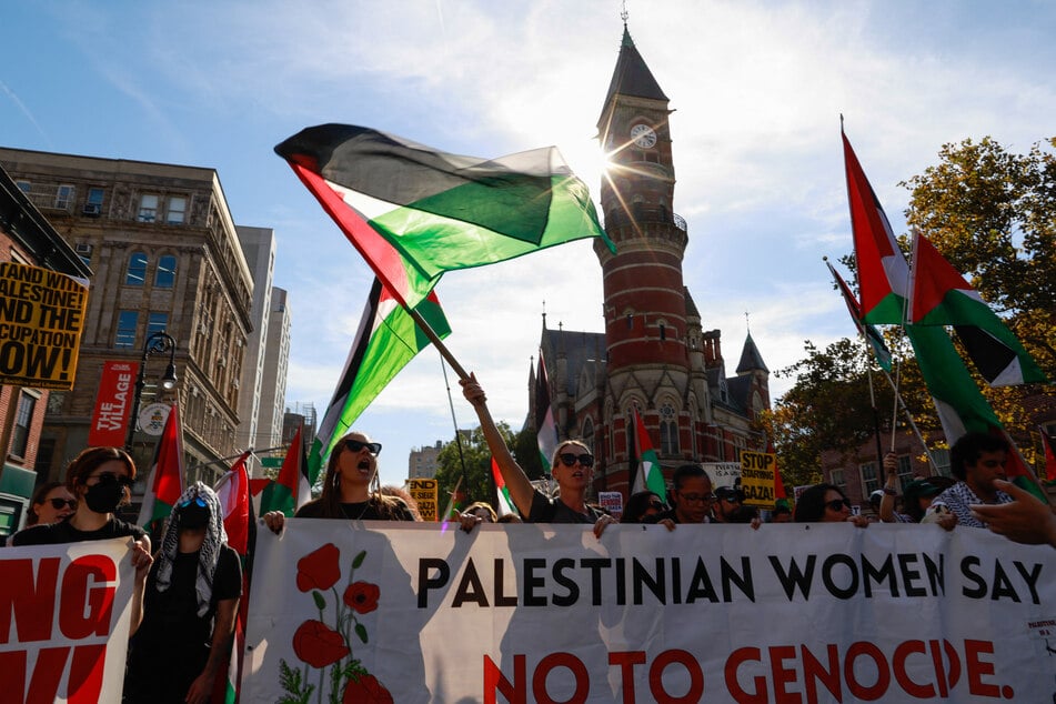 Protesters gather during the "Rise Up for Gaza" international day of action at Washington Square Park in New York City on October 4, 2025.