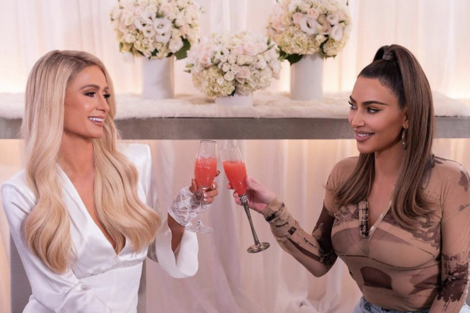 During her interview with Access Hollywood, Paris Hilton (l.) briefly touched on Kim Kardashian's romance with Pete Davidson.