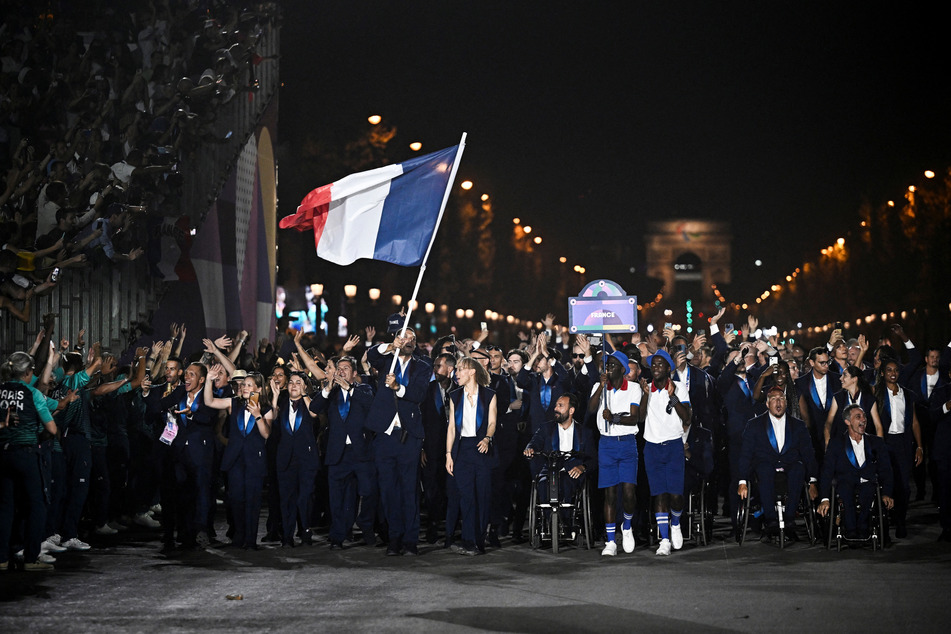 The French Paralympic team marched down the Champs-Élysées to a rapturous reception from onlookers.