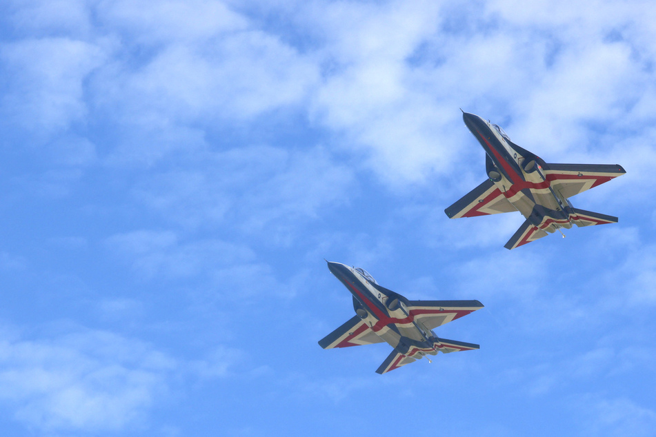 Taiwan Air Force fighter aircraft escorted Pelosi's flight, along with US figher jets.